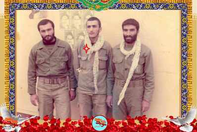 نفر وسط شهید علی‌اکبر ابراهیمی